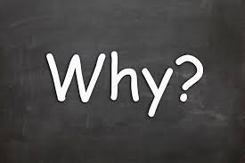The word “Why?” written in white chalk on a blackboard, symbolizing curiosity and the search for root causes in functional medicine and autism coaching.